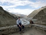 212 Jerome Ryan On Kagbeni Gompa Roof With View Towards Upper Mustang I went to the roof of the Kagbeni gompa and admired the view of the entrance to upper Mustang. Although it may look serene, the afternoon wind actually bowled me over on the rood. Be careful.